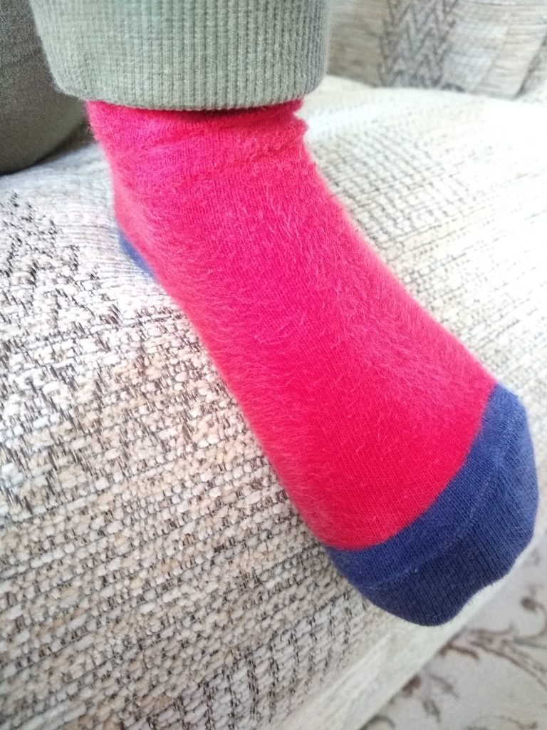 A red and dark blue sock.