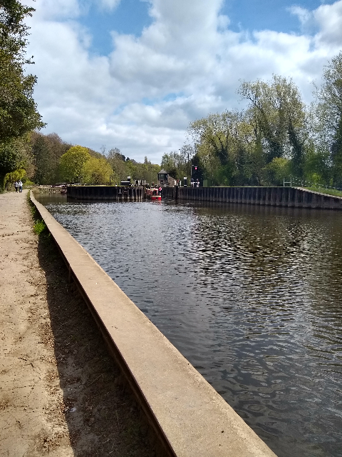 A photo of a canal boat entering the lock.