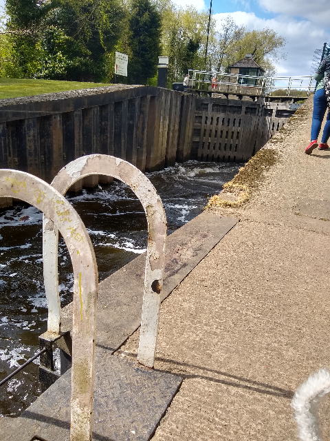 A photo of water being pumped out of the lock.