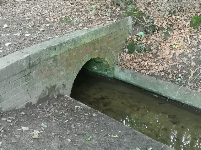 A small tunnel over a watercourse.