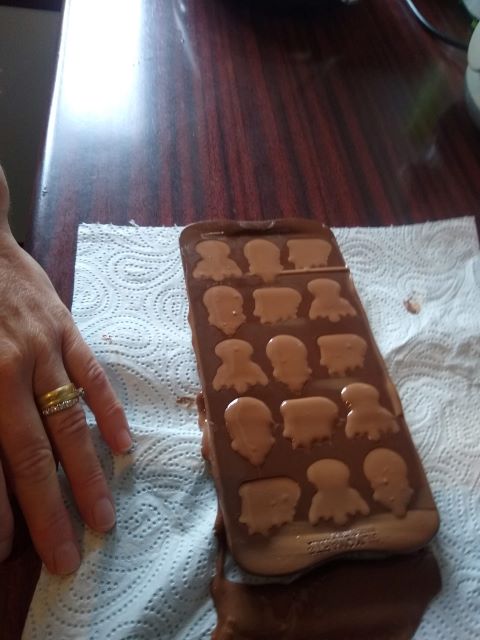 A photo of the melted chocolates in the moulds.