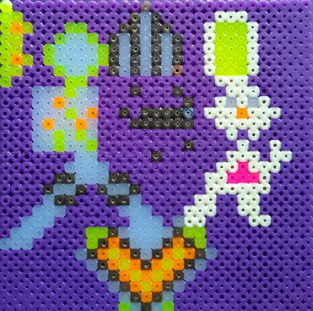 A photo of an abstract Hama bead design showing gold coins; a gold ingot; a gold and light blue tent; a cream-coloured clown; a slice of cream-coloured bread with yellow butter on top; a patch of light blue with orange and yellow spots; a completely light blue rainbow; Bo's name in yellow, orange and light blue; and a purple background.