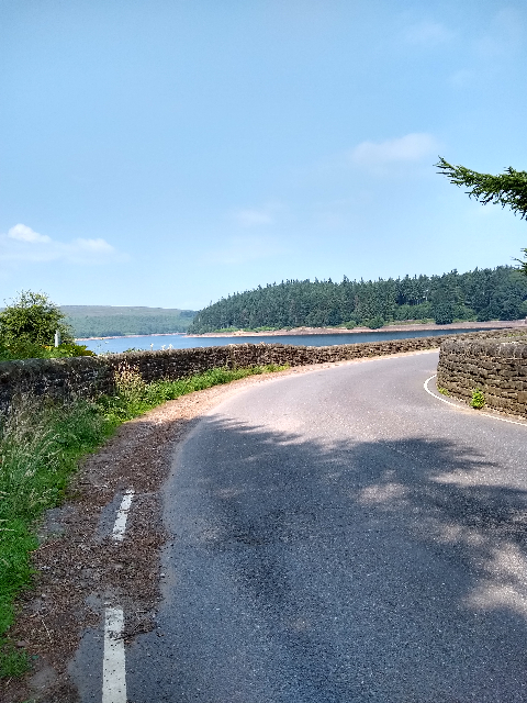 A view of the road curving down towards the dam wall.
